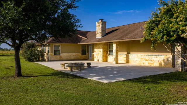 a view of a house with a big yard