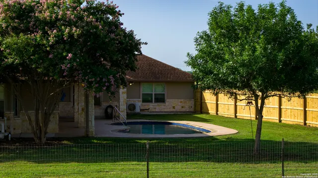 a view of a house with a big yard