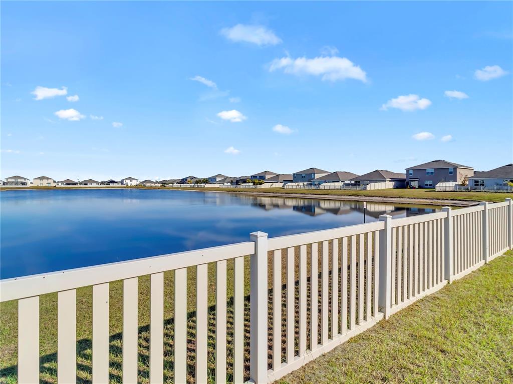 5446 Logan Cave Avenue Wimauma, FL 33598 - Photo 30 of 57 a view of city from a balcony