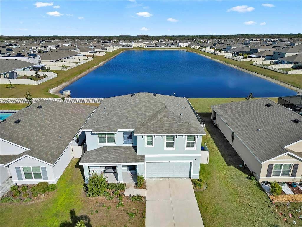 5446 Logan Cave Avenue Wimauma, FL 33598 - Photo 44 of 57 an aerial view of a house