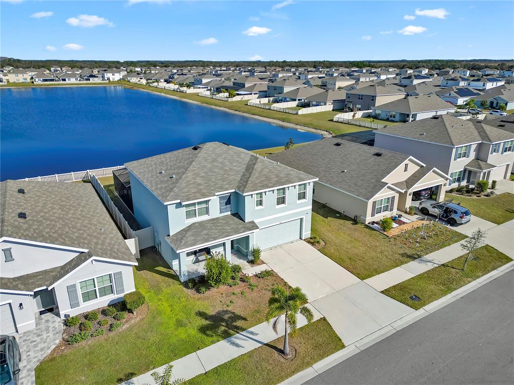 5446 Logan Cave Avenue Wimauma, FL 33598 - Photo 46 of 57 an aerial view of a house with a outdoor space
