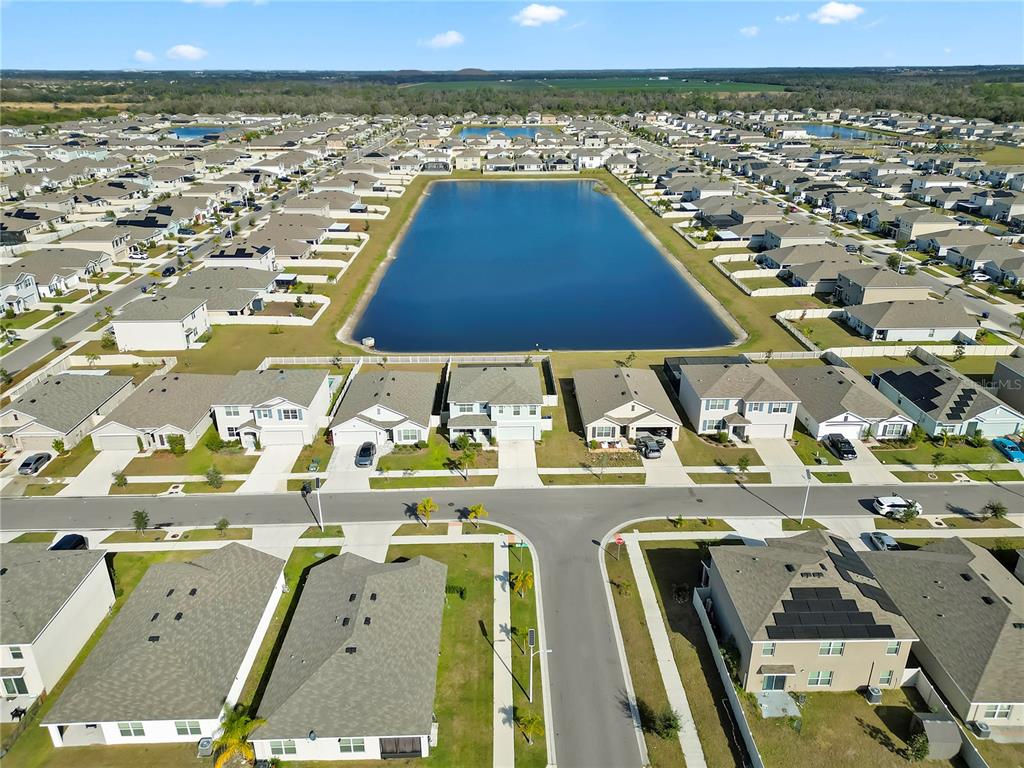 5446 Logan Cave Avenue Wimauma, FL 33598 - Photo 56 of 57 a view of a city