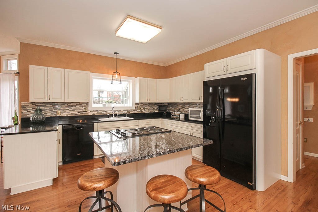 434 Longspur Road Highland Heights, OH 44143 - Photo 4 of 35 Updated eat-in kitchen includes granite countertops throughout, a coffee station, desk area and plenty of cabinets!