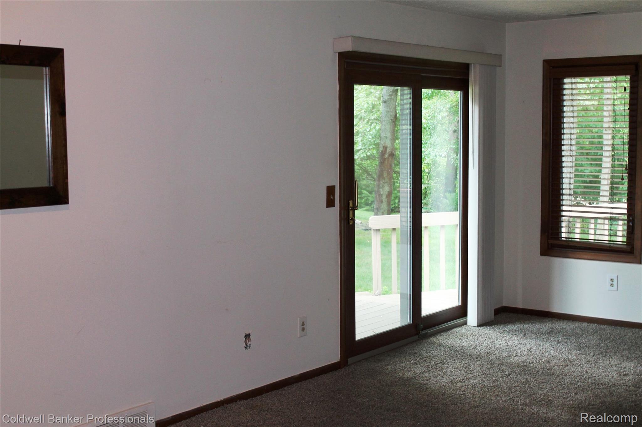 150 Woodstone Road, Unit 8 Waterford, MI 48327 - Photo 8 of 26 Doorwall to Deck IMG_2424.JPG