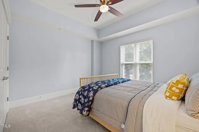 a view of hallway with livingroom and furniture