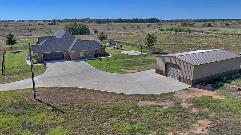 1150 Lone Star Road Bowie, TX 76230 - Photo 14 of 35 an aerial view of a house