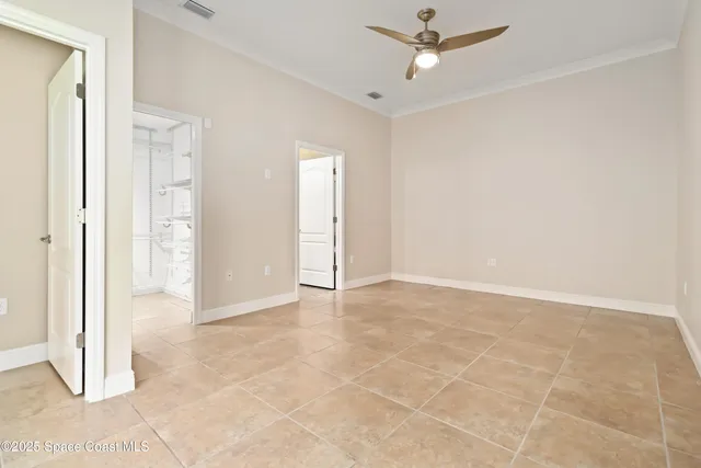 a bathroom with a granite countertop sink a mirror and shower