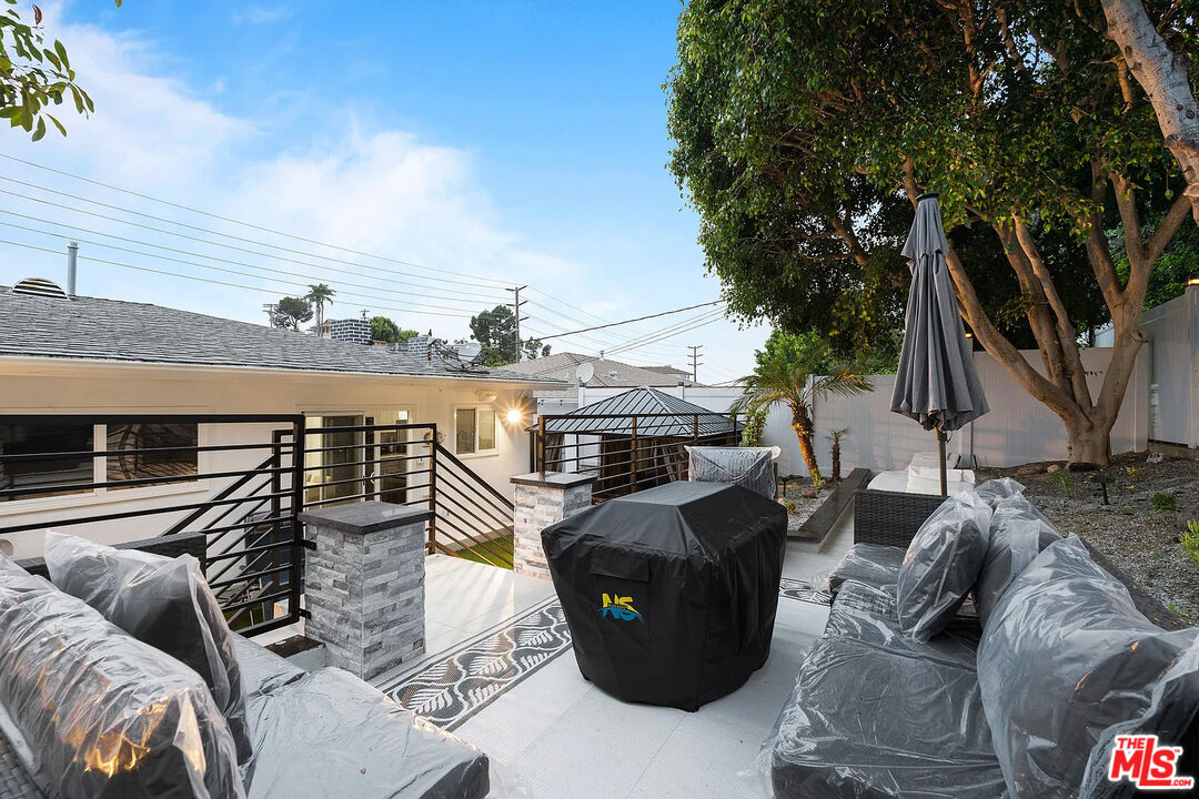 8222 Pershing Drive Playa del Rey, CA 90293 - Photo 13 of 36 a view of balcony with furniture and wooden deck