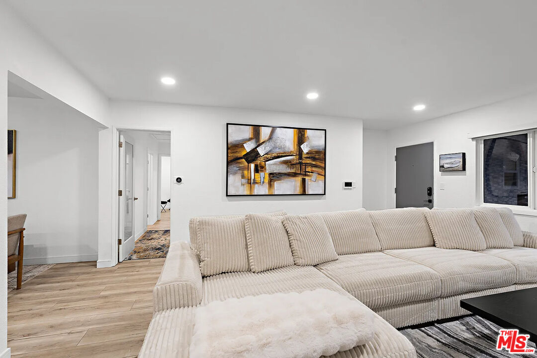 8222 Pershing Drive Playa del Rey, CA 90293 - Photo 17 of 36 a living room with furniture and a couch