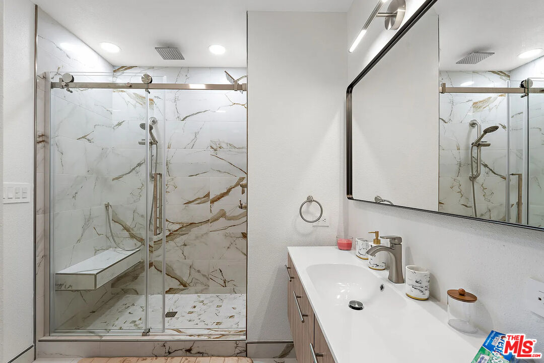 8222 Pershing Drive Playa del Rey, CA 90293 - Photo 21 of 36 a bathroom with a sink and a mirror