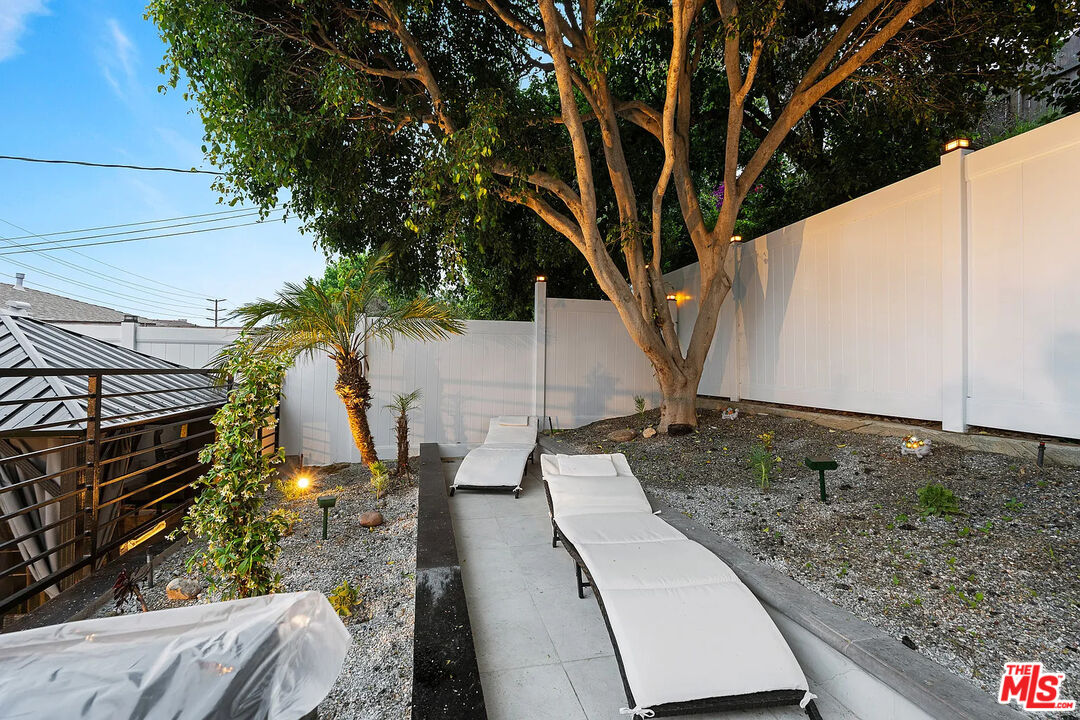 8222 Pershing Drive Playa del Rey, CA 90293 - Photo 7 of 36 a view of a backyard with wooden fence
