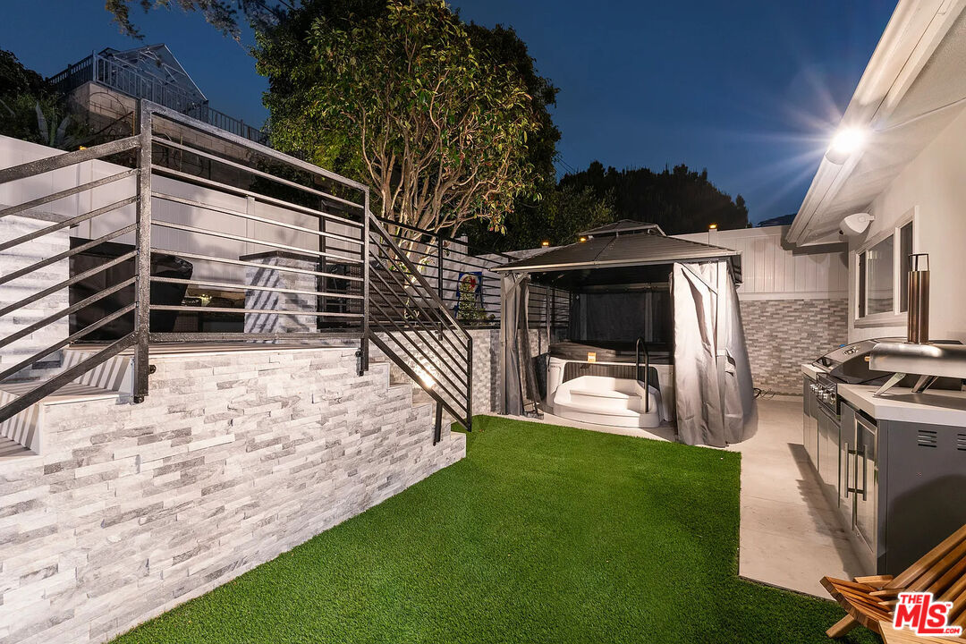 8222 Pershing Drive Playa del Rey, CA 90293 - Photo 9 of 36 a view of a backyard with furniture and a grill
