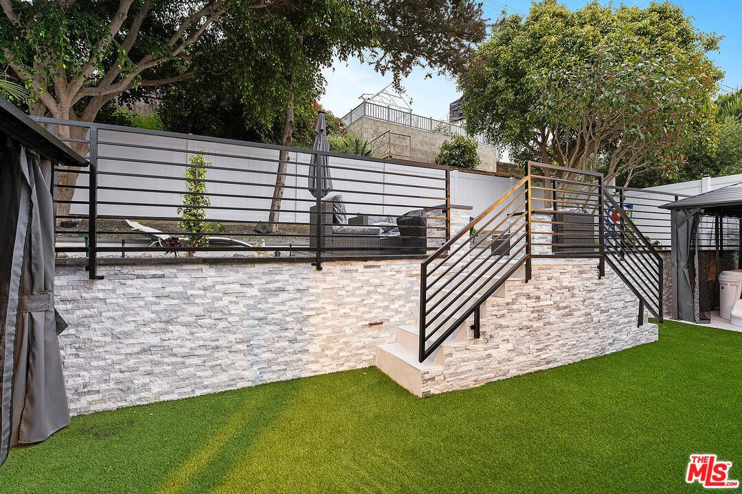 8222 Pershing Drive Playa del Rey, CA 90293 - Photo 10 of 36 a view of a backyard with side of the house