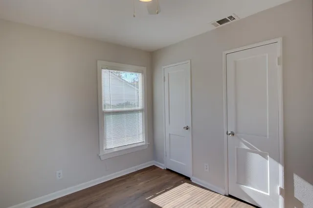 a view of an empty room and window