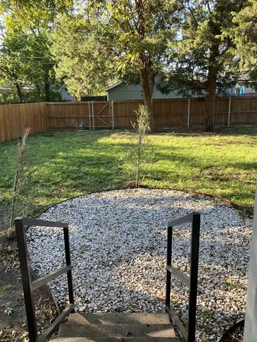 a view of a backyard with a sink