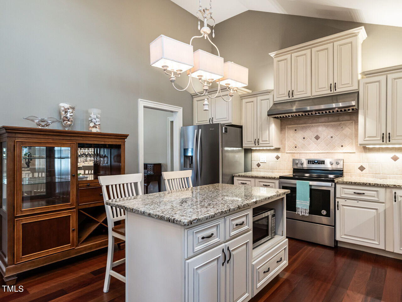 2705 Rothgeb Drive Raleigh, NC 27609 - Photo 11 of 35 The central kitchen island is perfect as a prep area and gathering spot!