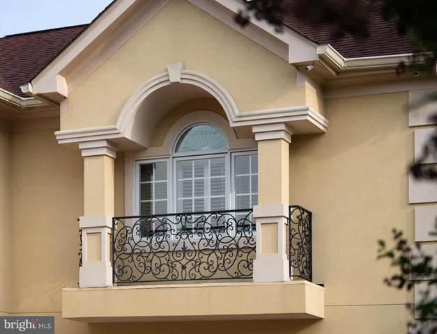 a view of entryway and hall with dining room