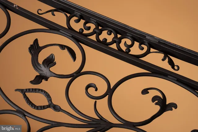 a view of a house with swimming pool and sitting area