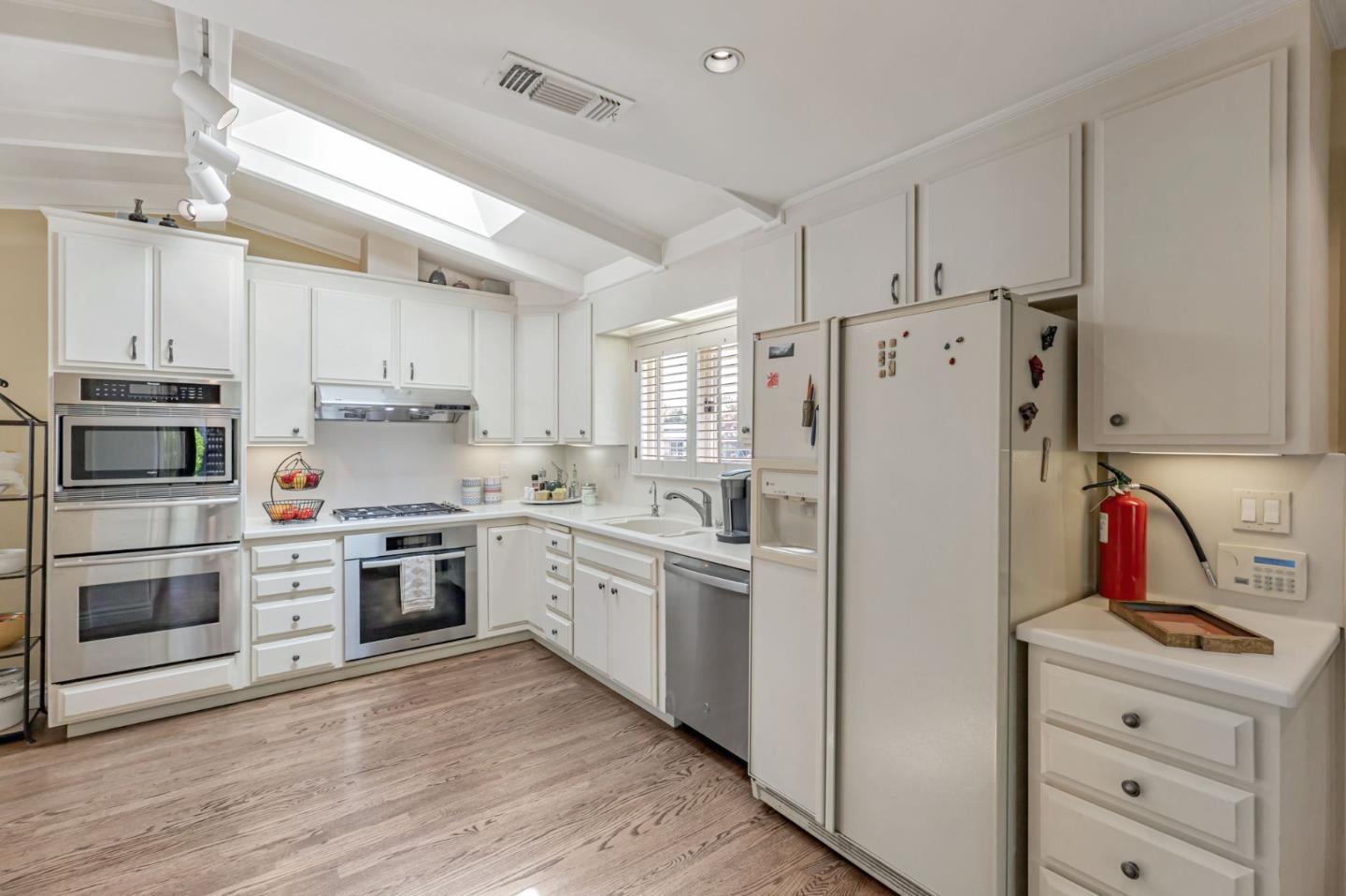 3231 Fieldcrest Drive Sacramento, CA 95821 - Photo 20 of 95 a kitchen with cabinets stainless steel appliances and a counter space