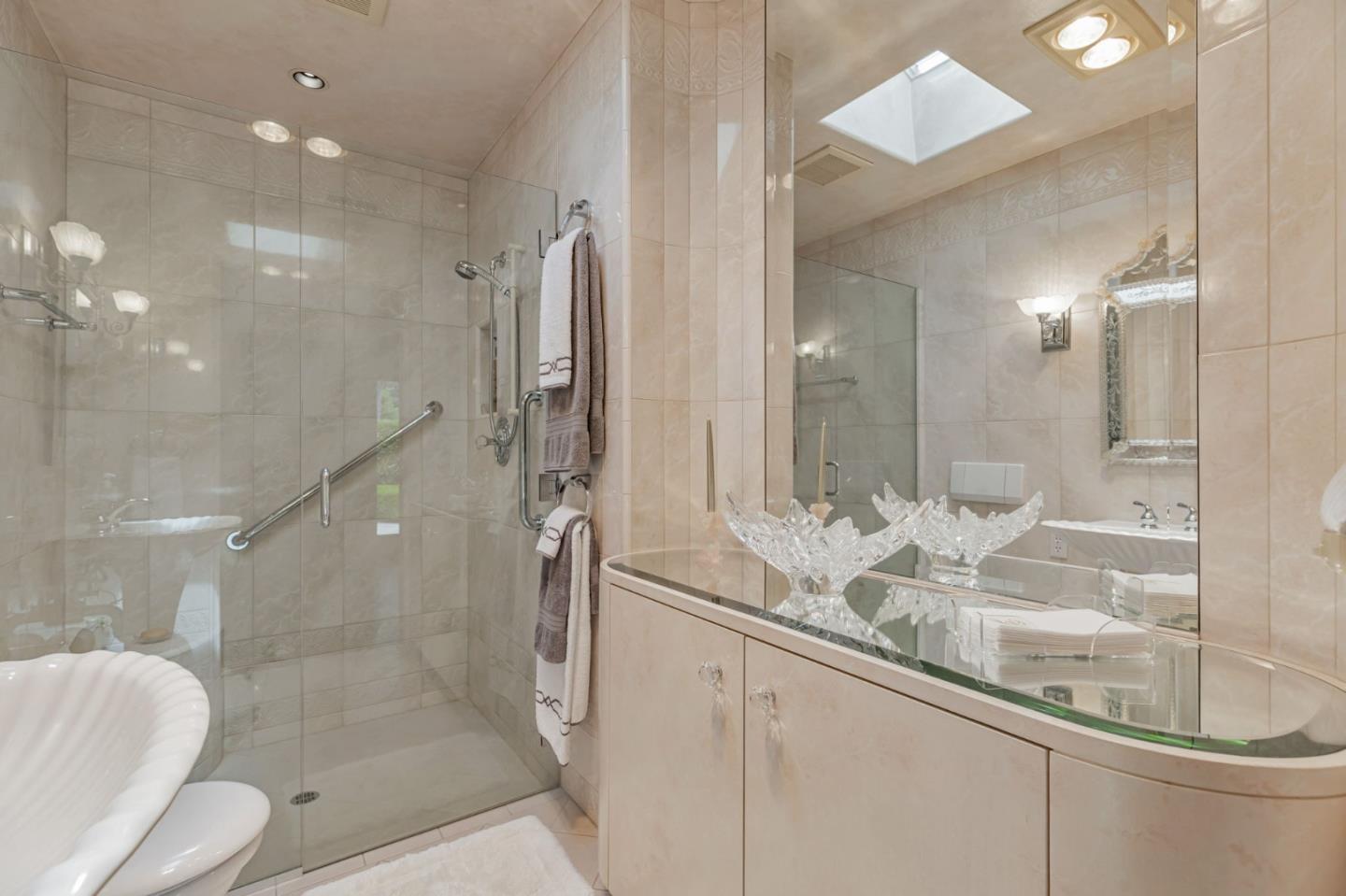 3231 Fieldcrest Drive Sacramento, CA 95821 - Photo 28 of 95 a bathroom with a granite countertop sink mirror and a shower