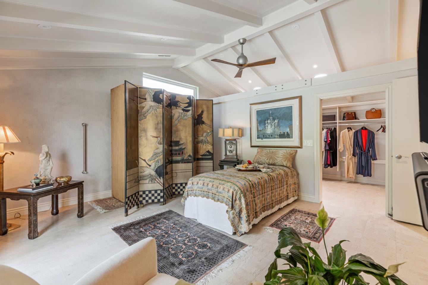 3231 Fieldcrest Drive Sacramento, CA 95821 - Photo 48 of 95 a spacious bedroom with a bed a couch and a walk in closet