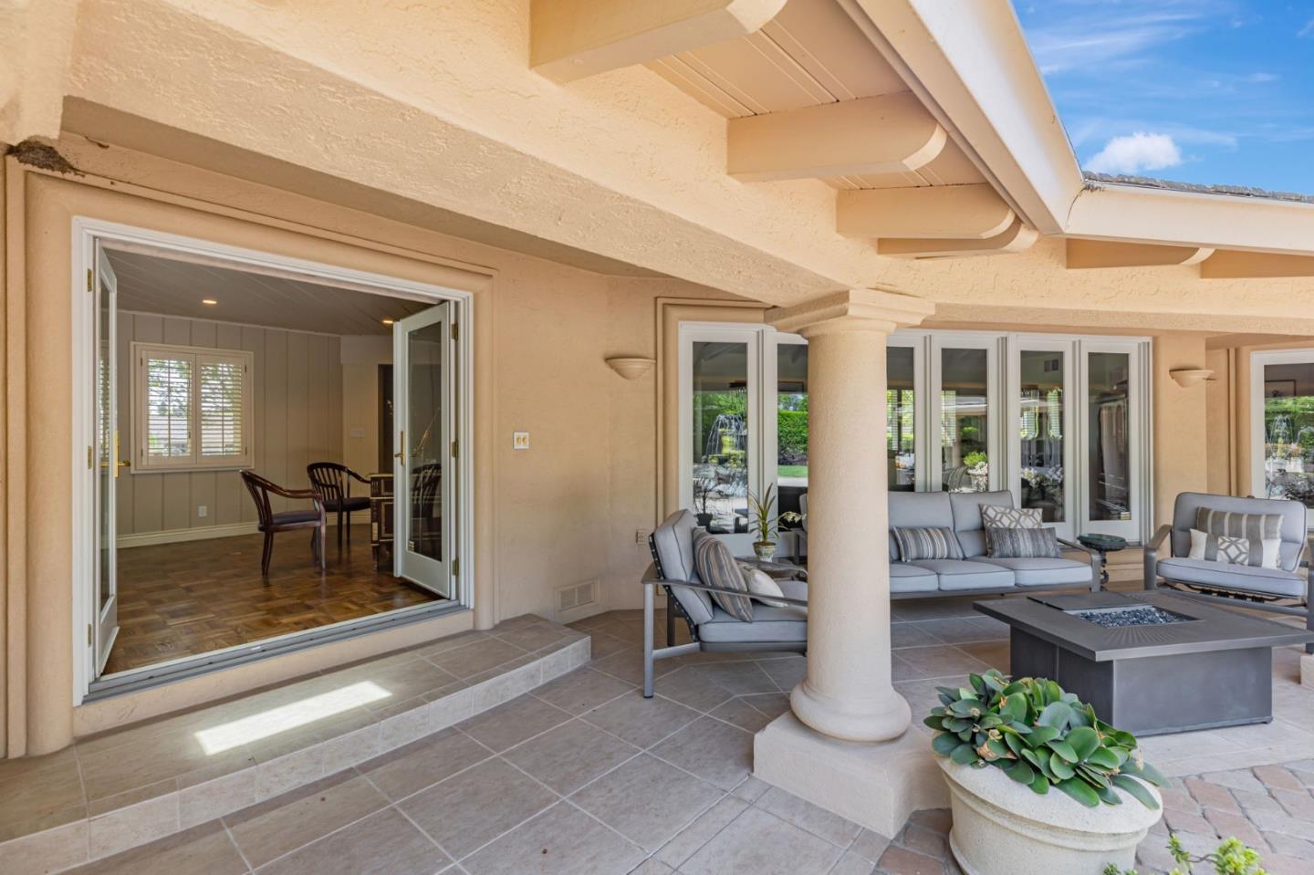 3231 Fieldcrest Drive Sacramento, CA 95821 - Photo 58 of 95 a room with lots of potted plants and glass door