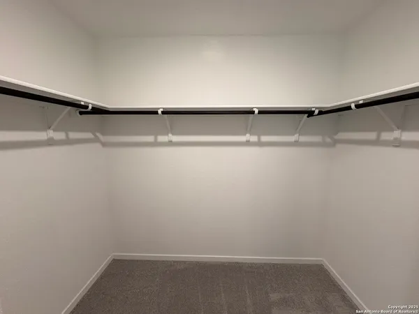 a view of small space with racks on the wall