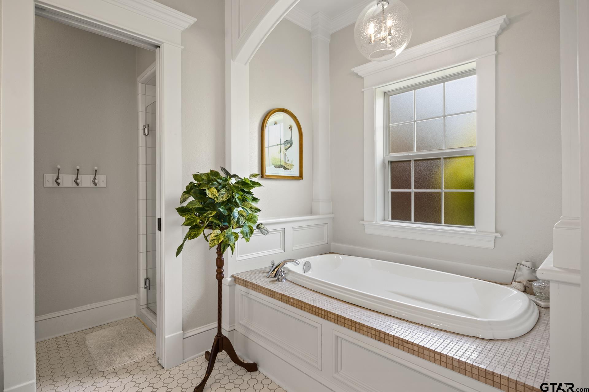 134 Private Road New Boston, TX 75570 - Photo 22 of 40 a bath tub sitting next to a blue sink