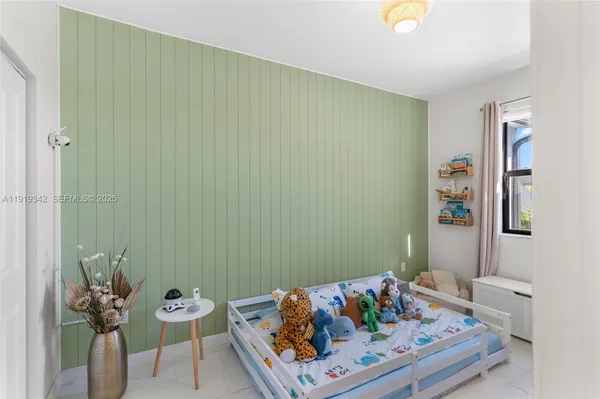 a room with toys and wooden floor
