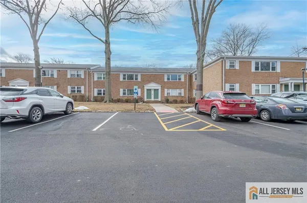 a cars parked in front of a building