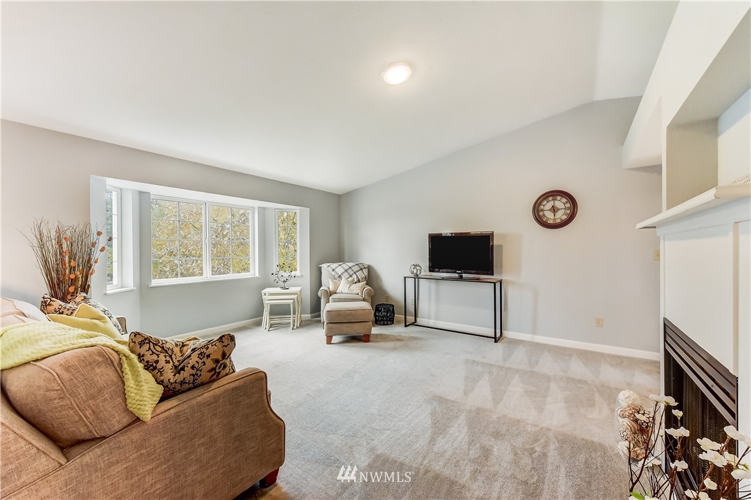 2319 Cherry Road Lake Stevens, WA 98258 - Photo 2 of 25 a living room with furniture and a flat screen tv