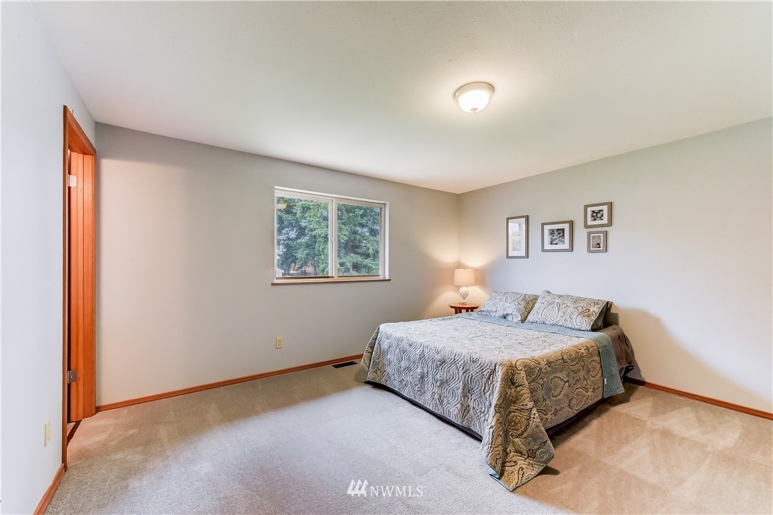 2319 Cherry Road Lake Stevens, WA 98258 - Photo 12 of 25 a bedroom with a bed and a window