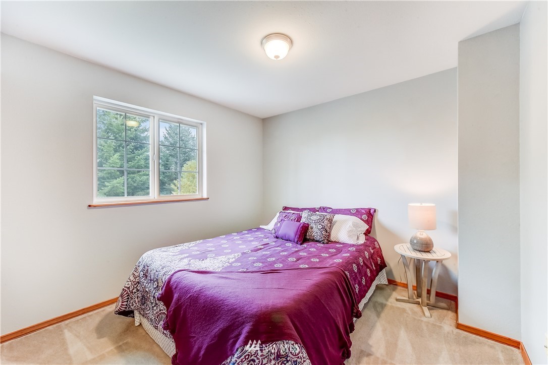 2319 Cherry Road Lake Stevens, WA 98258 - Photo 15 of 25 a bedroom with a bed and a window