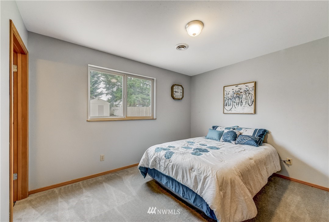 2319 Cherry Road Lake Stevens, WA 98258 - Photo 20 of 25 a bedroom with a bed and a window