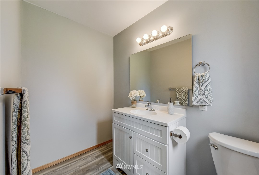 2319 Cherry Road Lake Stevens, WA 98258 - Photo 22 of 25 a bathroom with a sink vanity and a toilet