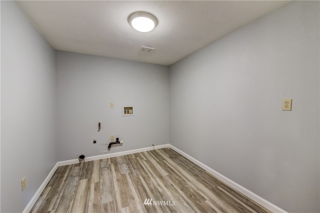 2319 Cherry Road Lake Stevens, WA 98258 - Photo 23 of 25 a view of a room with wooden floor