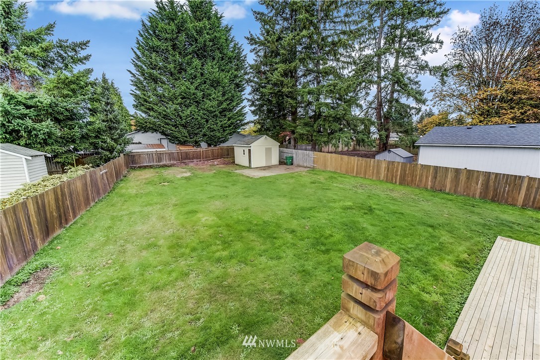2319 Cherry Road Lake Stevens, WA 98258 - Photo 8 of 25 a view of yard from deck having patio