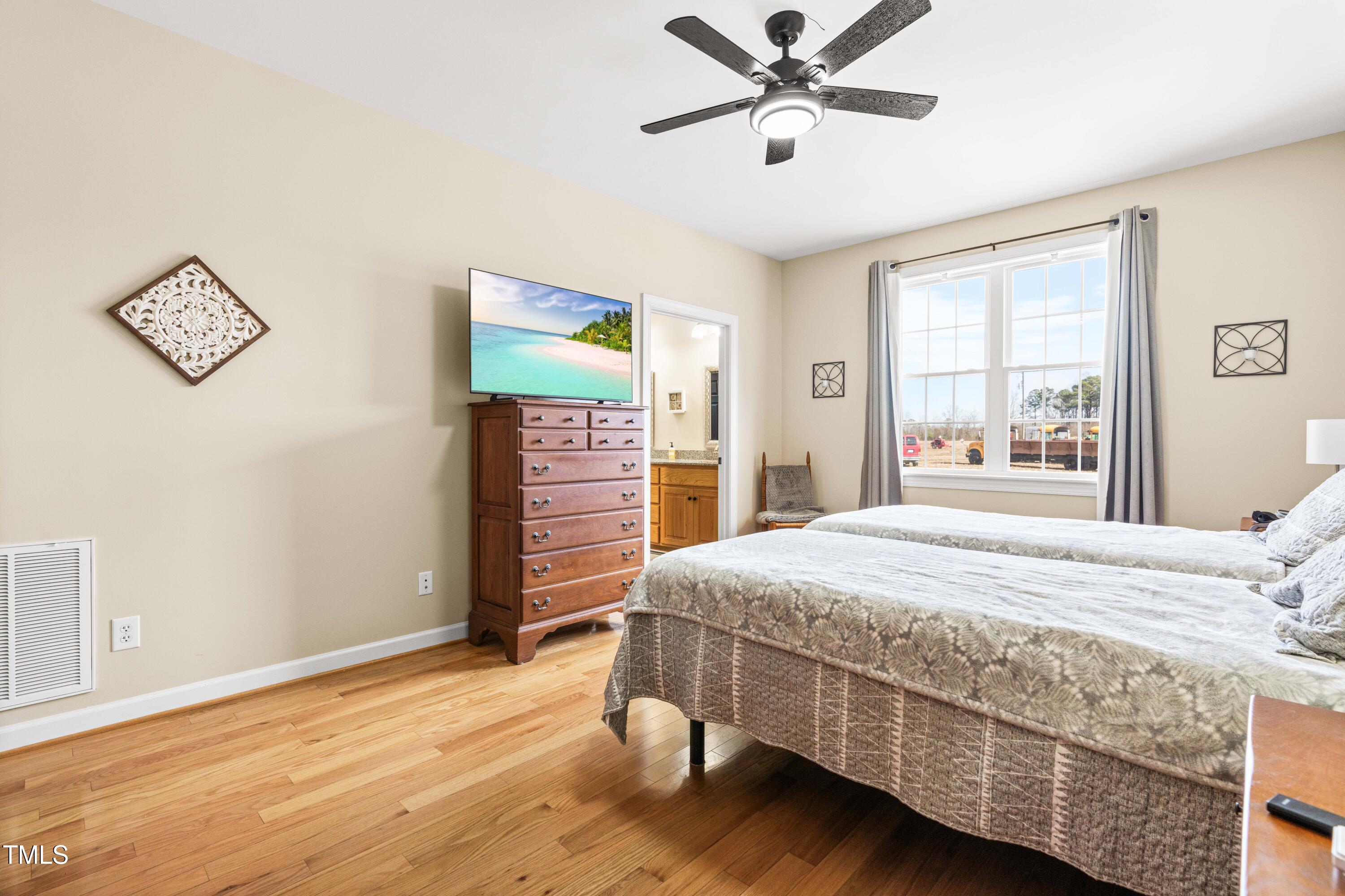1675 Cheves Road Zebulon, NC 27597 - Photo 19 of 40 Master bedroom