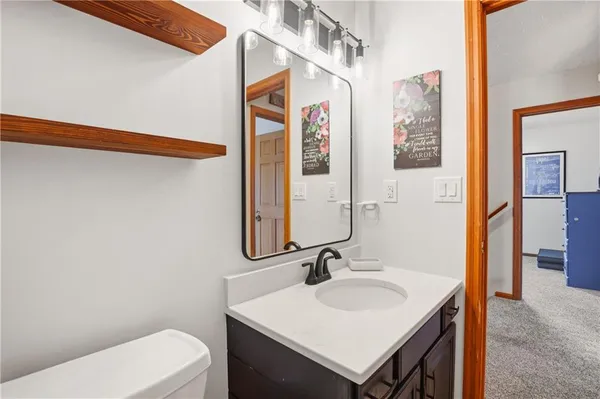 a bathroom with a sink and a toilet