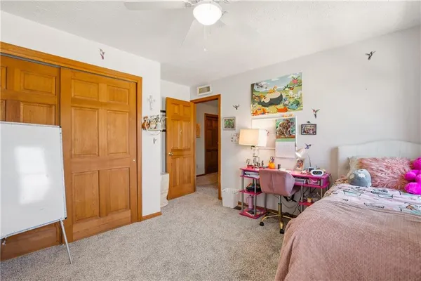 a room with furniture and a window