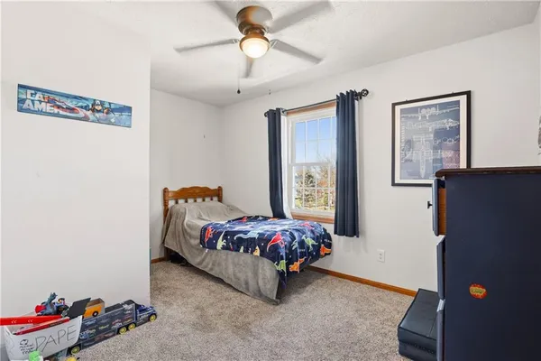 a room with a bed and a window