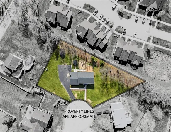 a picture of a building with a yard