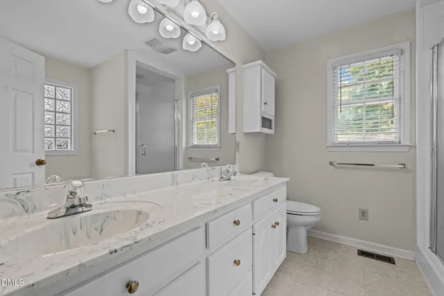 a white bath tub sitting next to a window