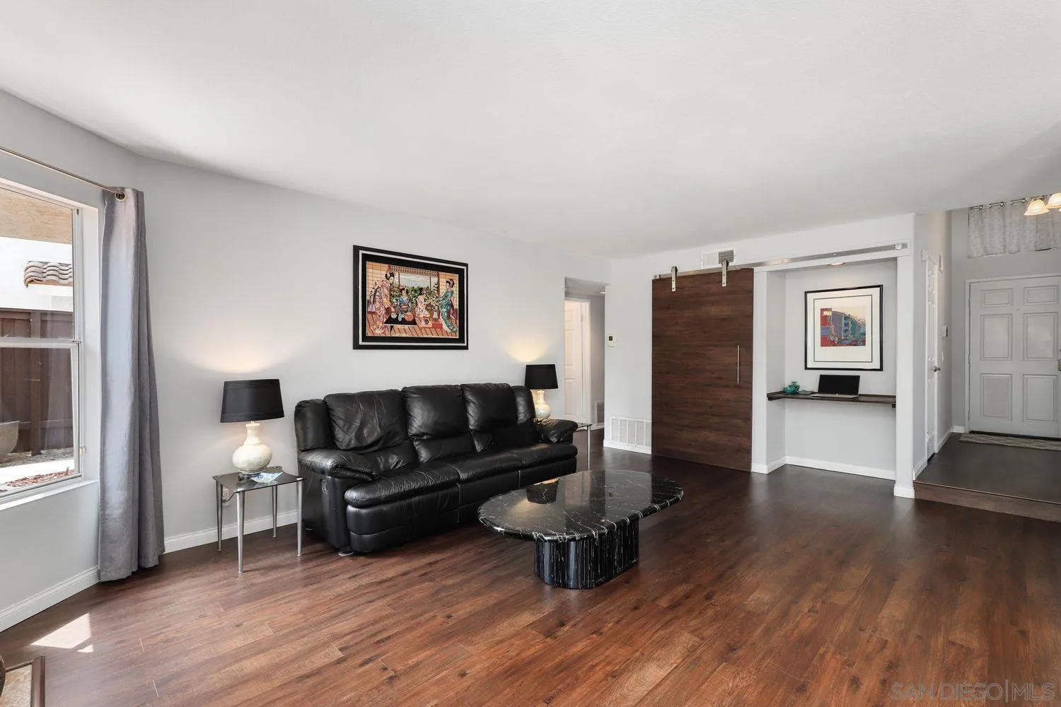 1769 Willowhaven Road Encinitas, CA 92024 - Photo 6 of 36 a living room with furniture and a wooden floor