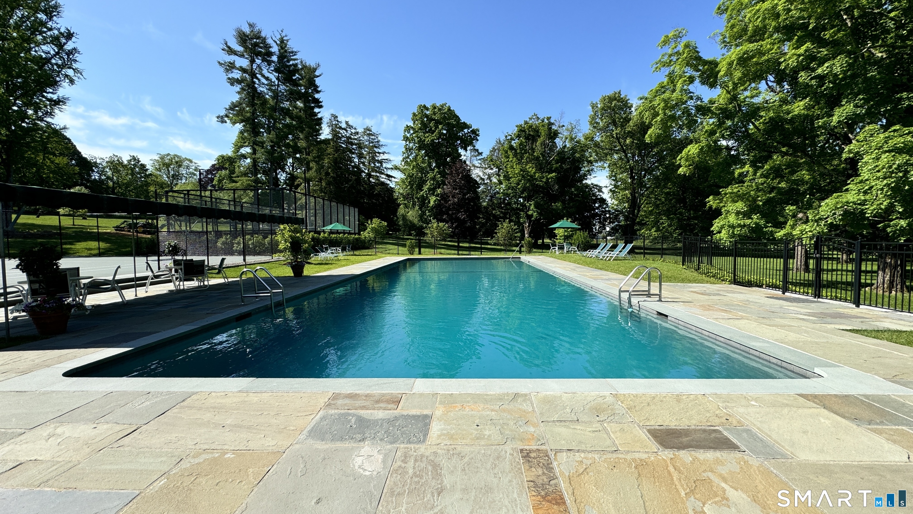 1 Great Elm Road Sharon, CT 06069 - Photo 8 of 39 Enjoy the heated gunite Junior olympic pool, or play a tennis, paddle or pickleball match.