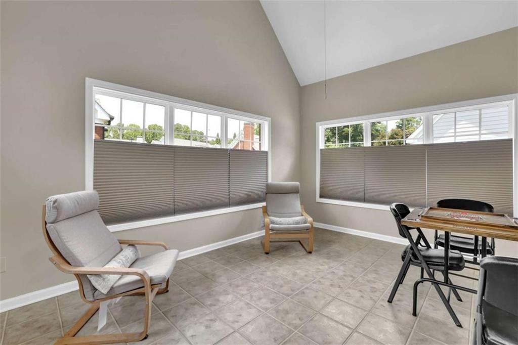 140 Stonegate Lane Canton, GA 30114 - Photo 11 of 38 a living room with furniture and a table