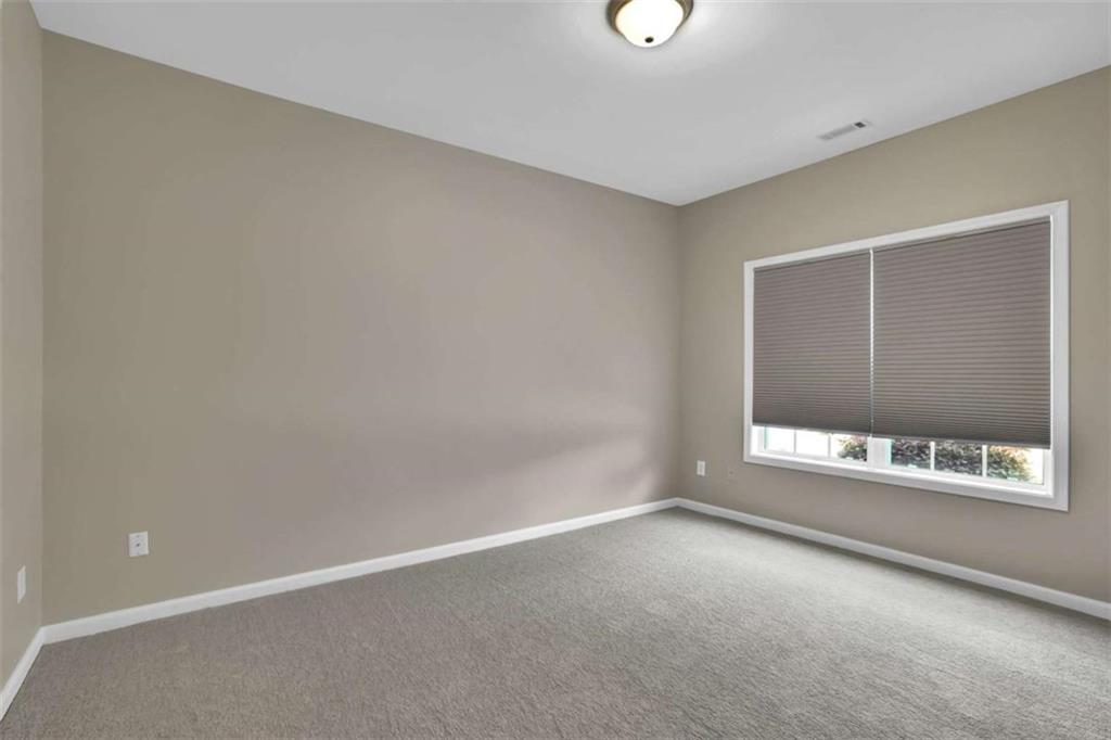 140 Stonegate Lane Canton, GA 30114 - Photo 29 of 38 a view of an empty room with a window