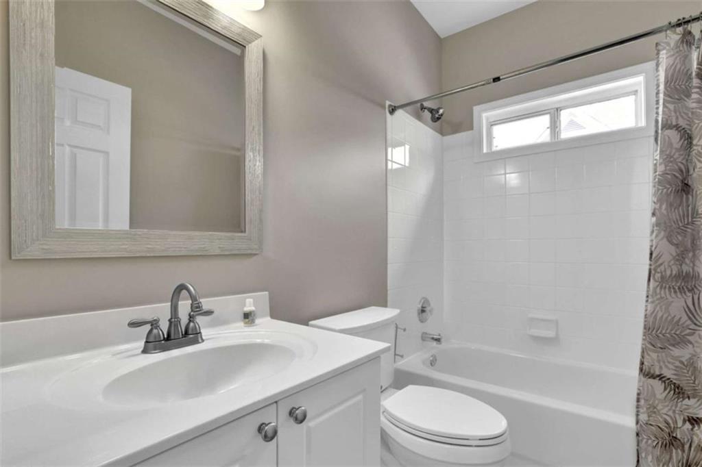 140 Stonegate Lane Canton, GA 30114 - Photo 31 of 38 a bathroom with a sink toilet and shower