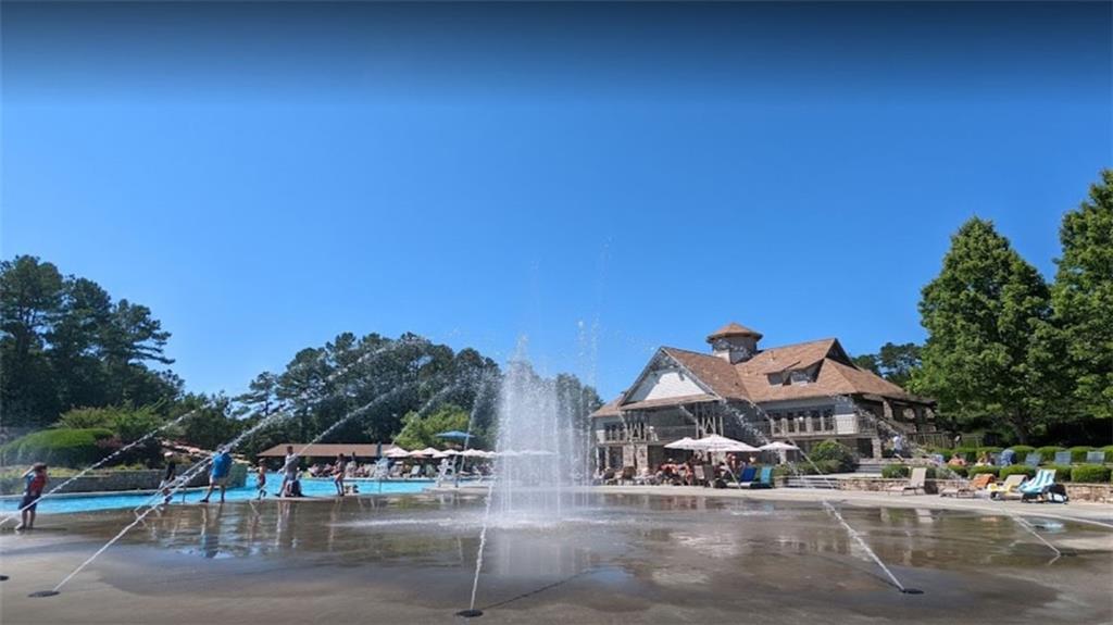 140 Stonegate Lane Canton, GA 30114 - Photo 36 of 38 a front view of a building with street view