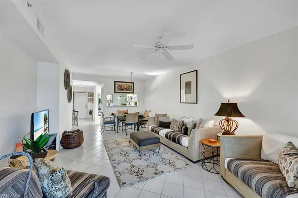 a living room with furniture and a couch